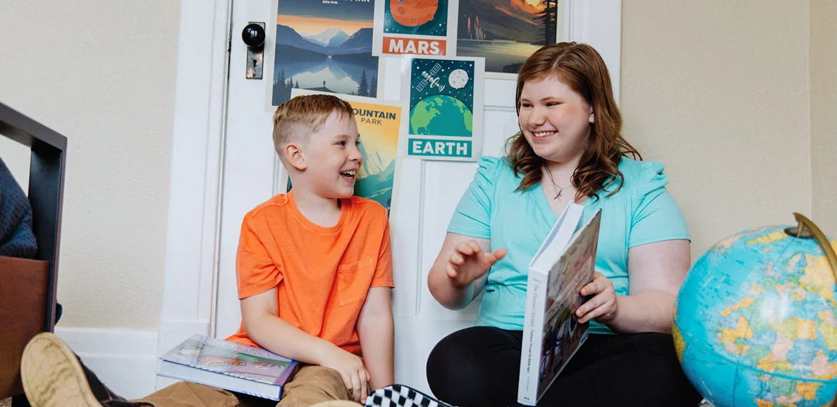 girl and boy smiling